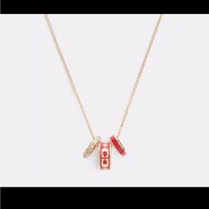 Elegant Gold and Red Pendant Necklace